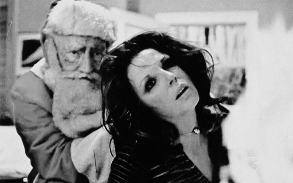 Joan Collins and "Santa" in Tales from the Crypt 1972.